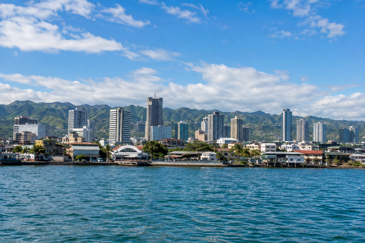 Illustrative Cebu-inspired coastal city scene with buildings and sea